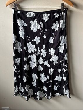 Wrapper Black Midi Skirt with a White Floral Pattern